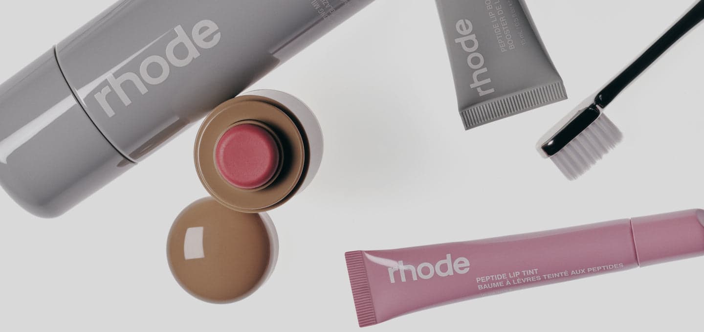 Temporary reference image of beauty products on a light surface